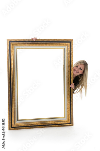 Woman Peeking Out from Behind Blank Picture Frame