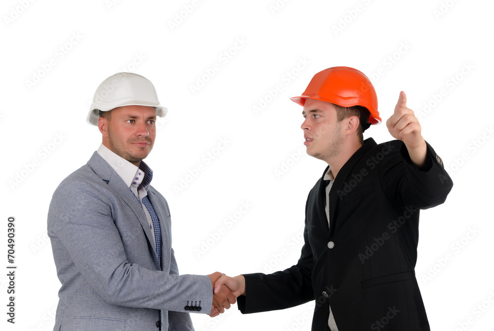 Architect welcoming a colleague and pointing Architect welcoming a colleague and pointing