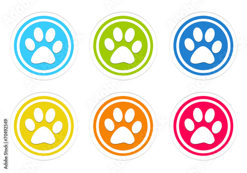 Set of rounded colorful icons with pet footprints