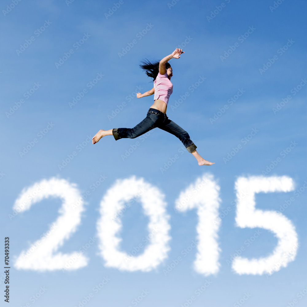 Woman jumping on the sky