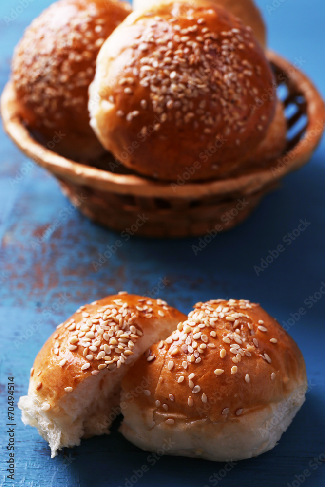 Tasty buns with sesame in wicker basket, Tasty buns with sesame in wicker basket,