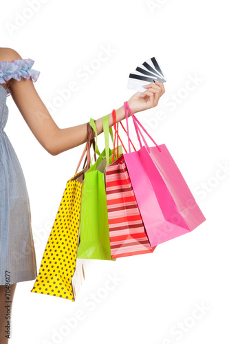 Asian woman hand show credit cards with shopping bags