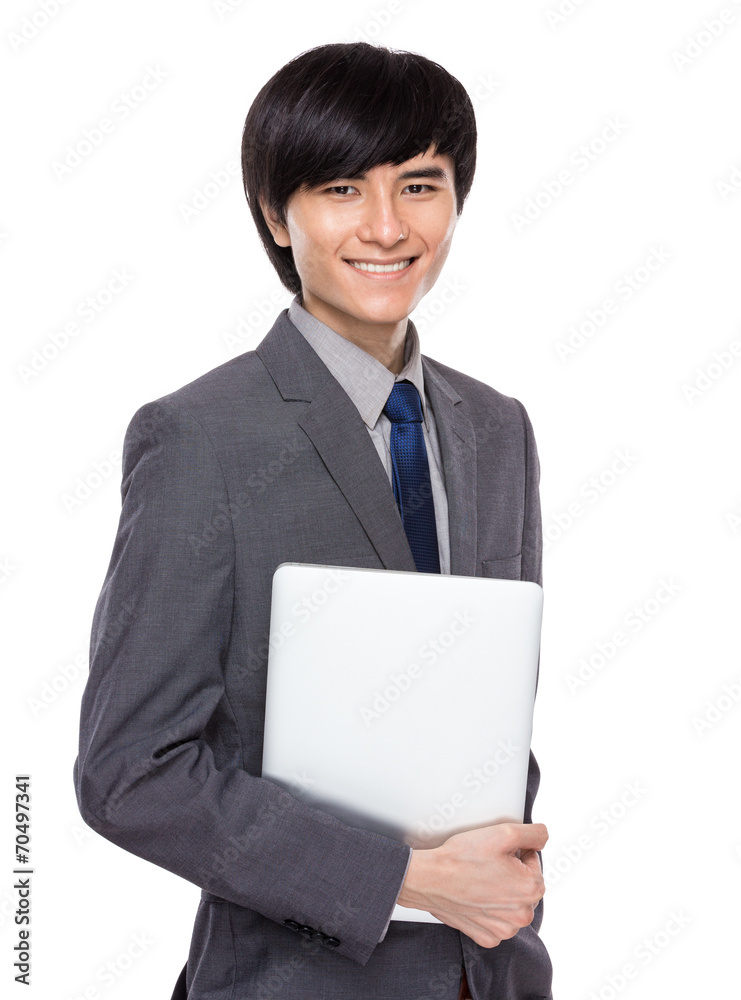 Asian businessman with laptop computer Asian businessman with laptop computer