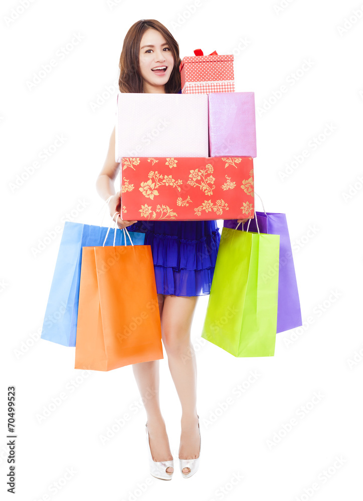 pretty woman holding shopping bags and gift boxes pretty woman holding shopping bags and gift boxes