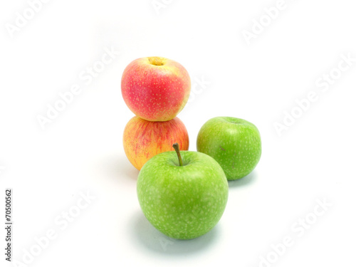 green and red apple on white background