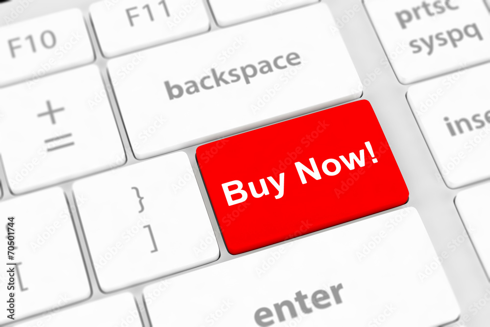 Buy now key on a white keyboard Buy now key on a white keyboard