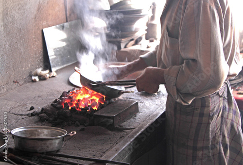 Traditional tinsmith or coppersmith work bench in Turkey
 photo