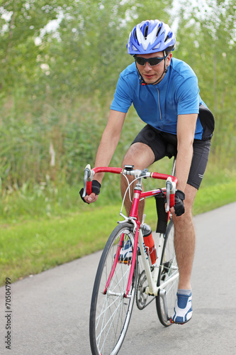 male cyclist on a race bike