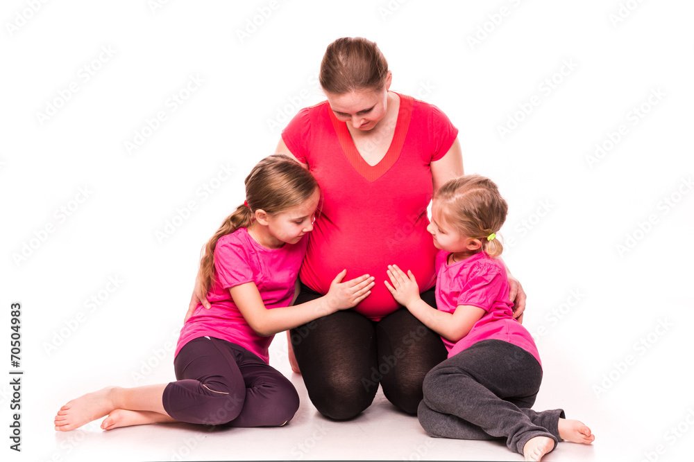 Pregnant woman with kids exercising isolated