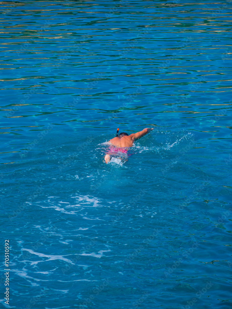 Man snorkeling in the sea