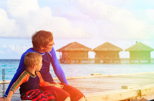 father and little son on tropical vacation
