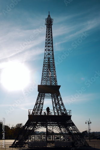 the Eiffel Tower illuminated by the sun