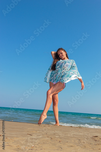 Woman laughing having fun in summer vacation holidays
