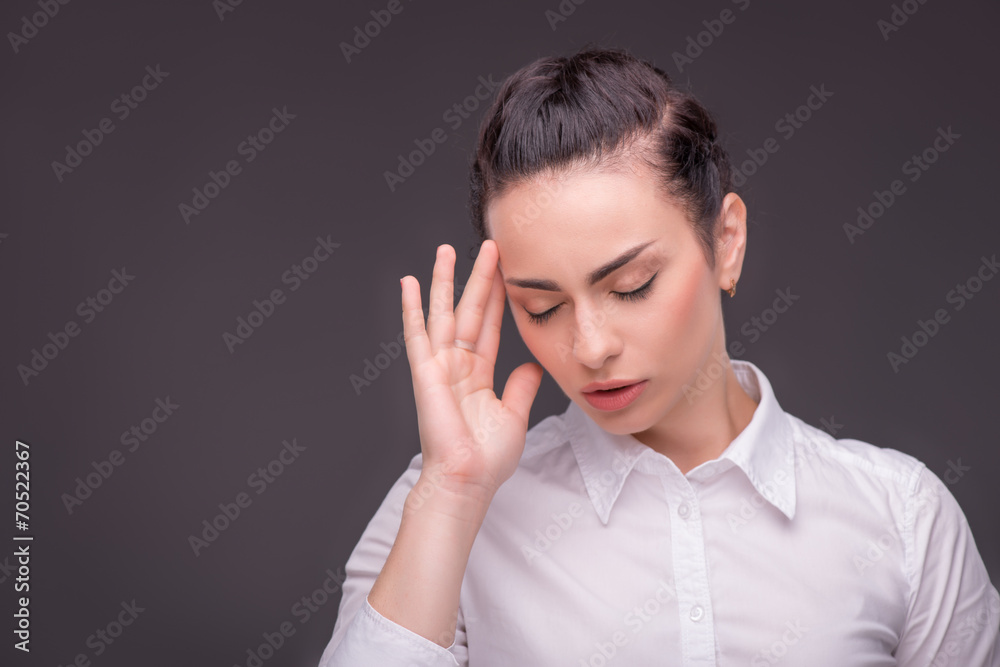 Serious woman wearing white blouse Serious woman wearing white blouse