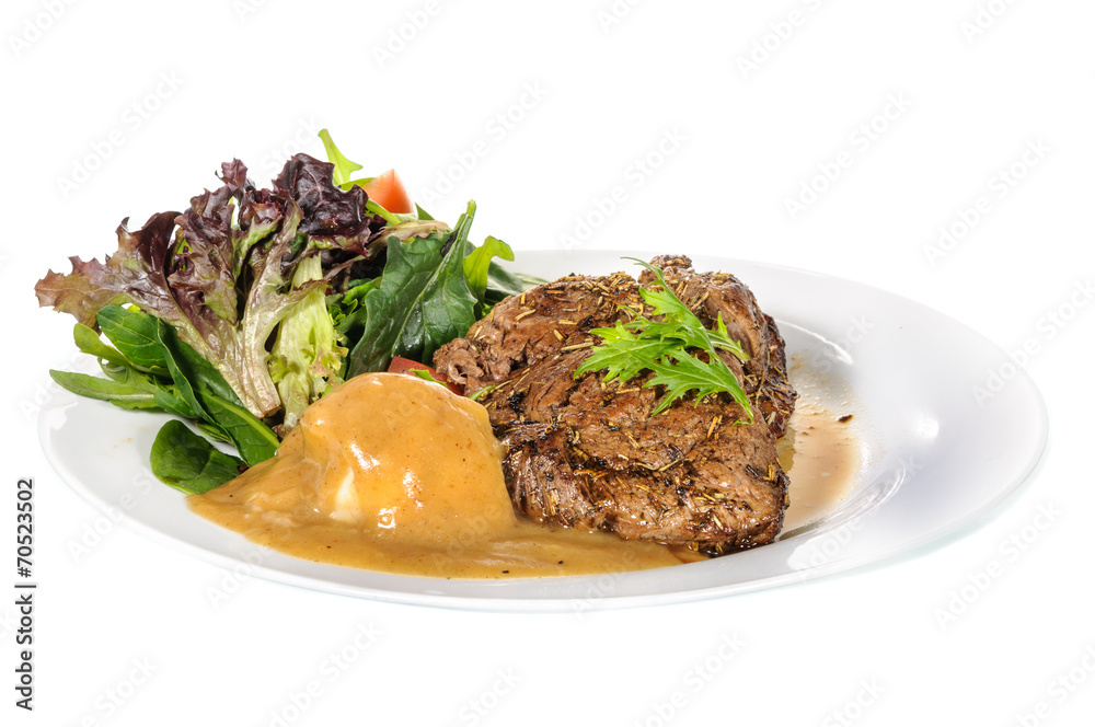 Rump steak with mashed potatoes and mix vegetable on plate Rump steak with mashed potatoes and mix vegetable on plate