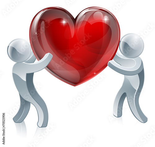 People holding giant heart