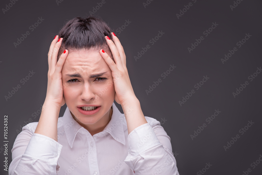 Serious woman wearing white blouse Serious woman wearing white blouse