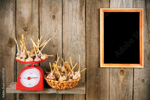 Garlic on scales and in a basket