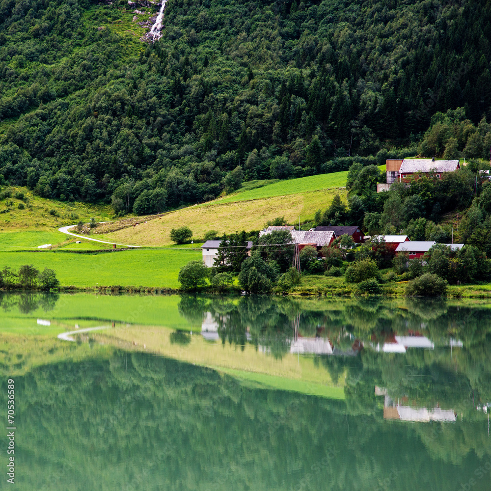 Beautiful Norwegian landscape with water reflection Beautiful Norwegian landscape with water reflection