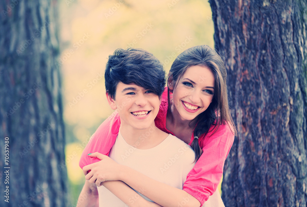Fototapeta premium Beautiful young couple in park