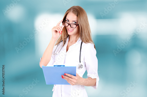 Young beautiful doctor in h...