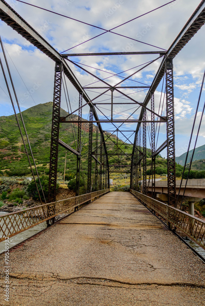 Steel bridge crossing a river