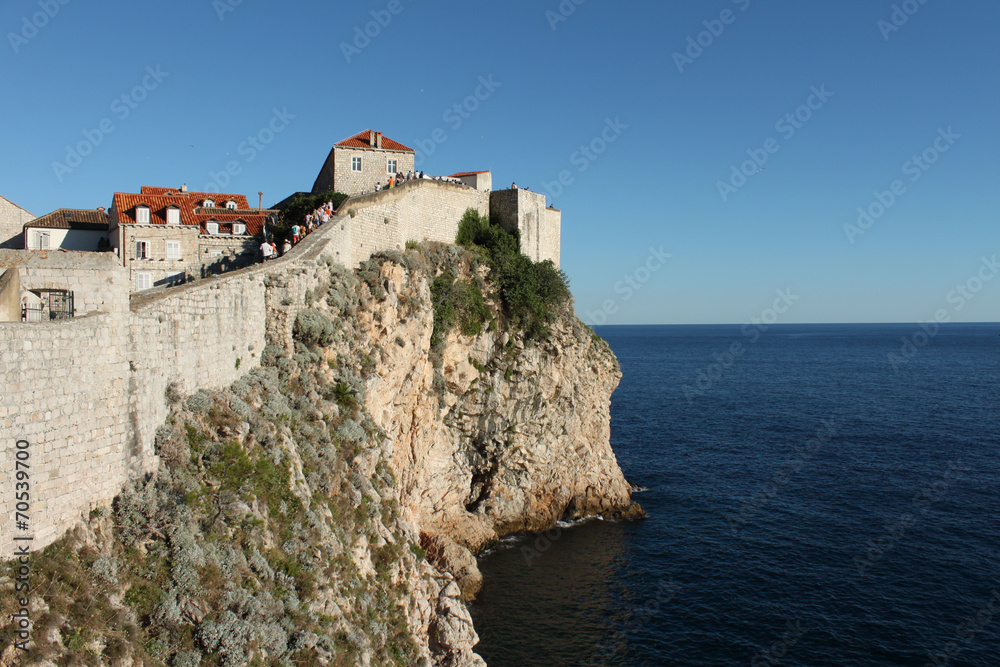 Dubrovnik,the old wall, rocks and blue sea
