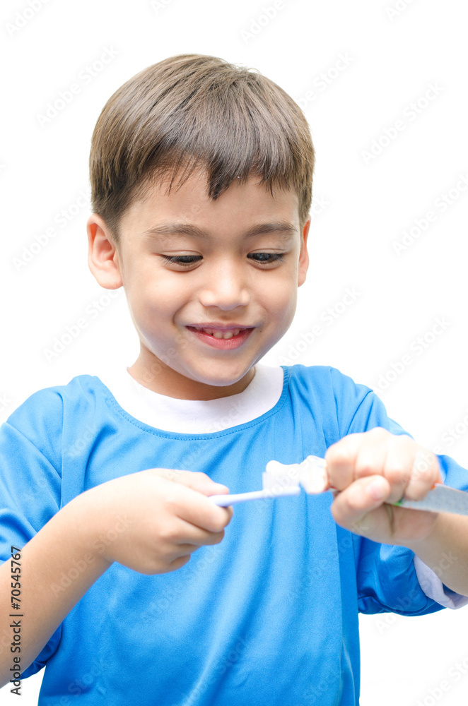 Little Boy Brushing Teeth on white background Little Boy Brushing Teeth on white background