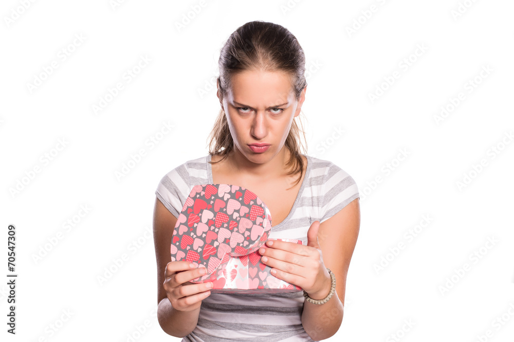 Cute young girl not happy with birthday present Cute young girl not happy with birthday present
