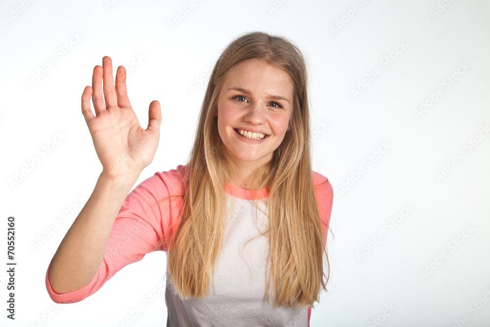 Scandinavian cute young girl waving with her hand Scandinavian cute young girl waving with her hand