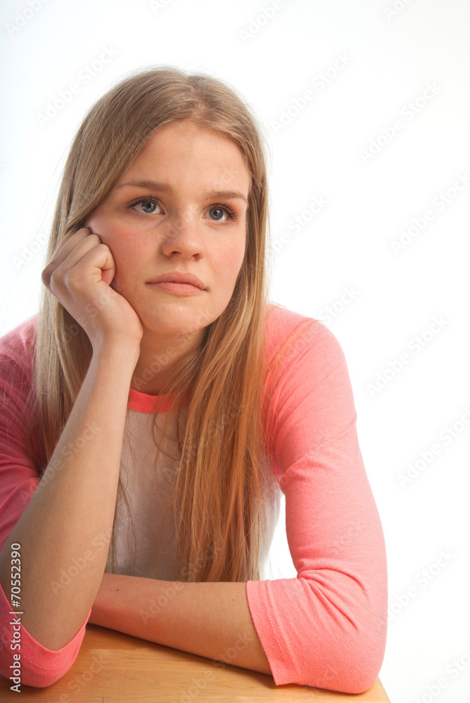 Scandinavian cute young girl portrait with head in one hand look Scandinavian cute young girl portrait with head in one hand look