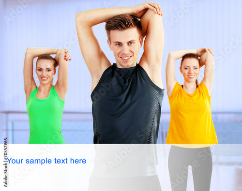 Young people exercising at gym