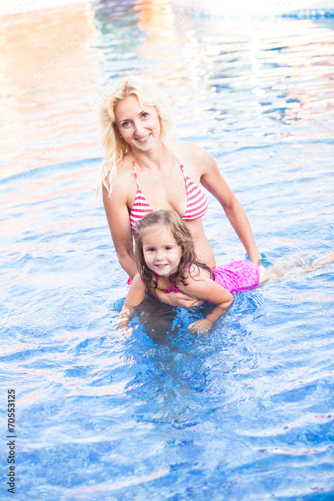 Mother and child at the swimming pool