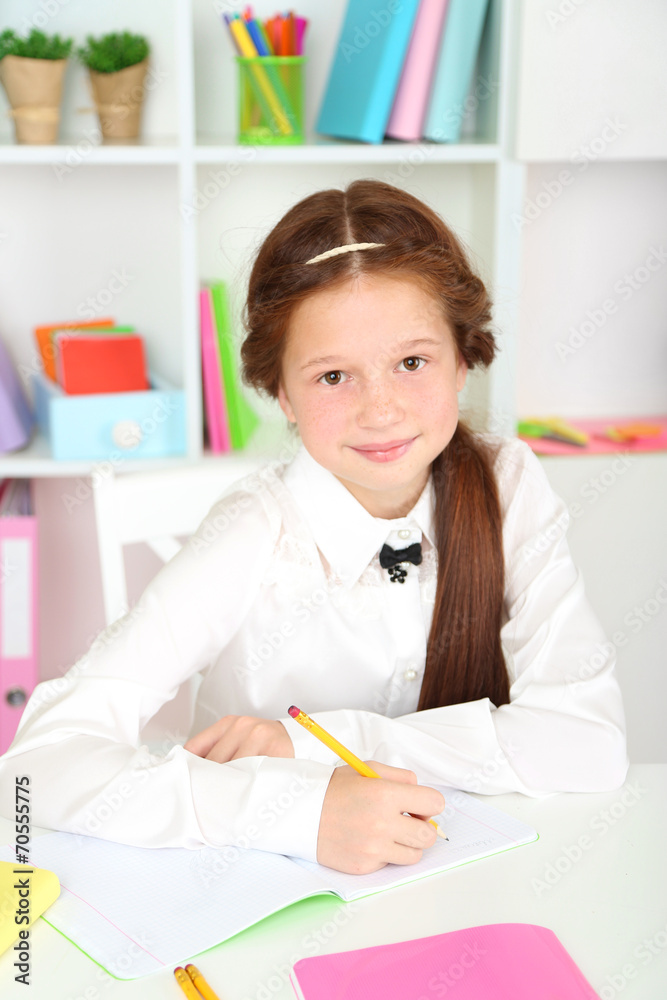 Cute girl at workplace in classroom Cute girl at workplace in classroom