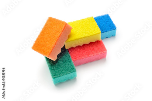 A group of colored kitchen sponges isolated on white background
