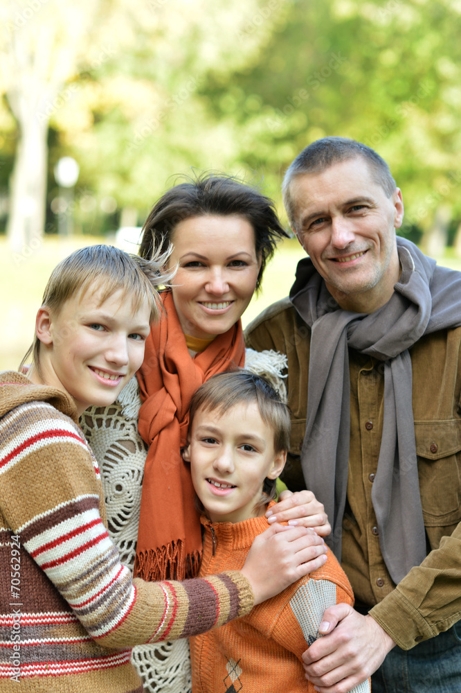Family relaxing in autumn park Family relaxing in autumn park