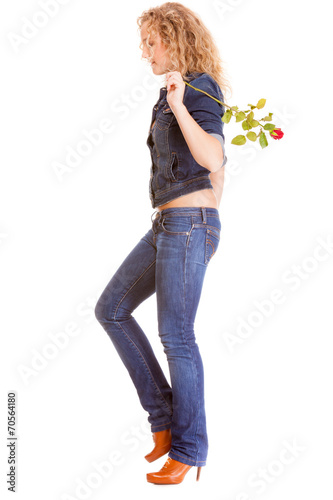 Denim fashion. Full length blonde girl in blue jeans photo