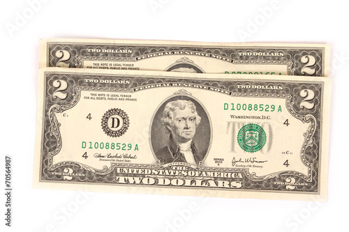 United States two dollar bill on a white background photo