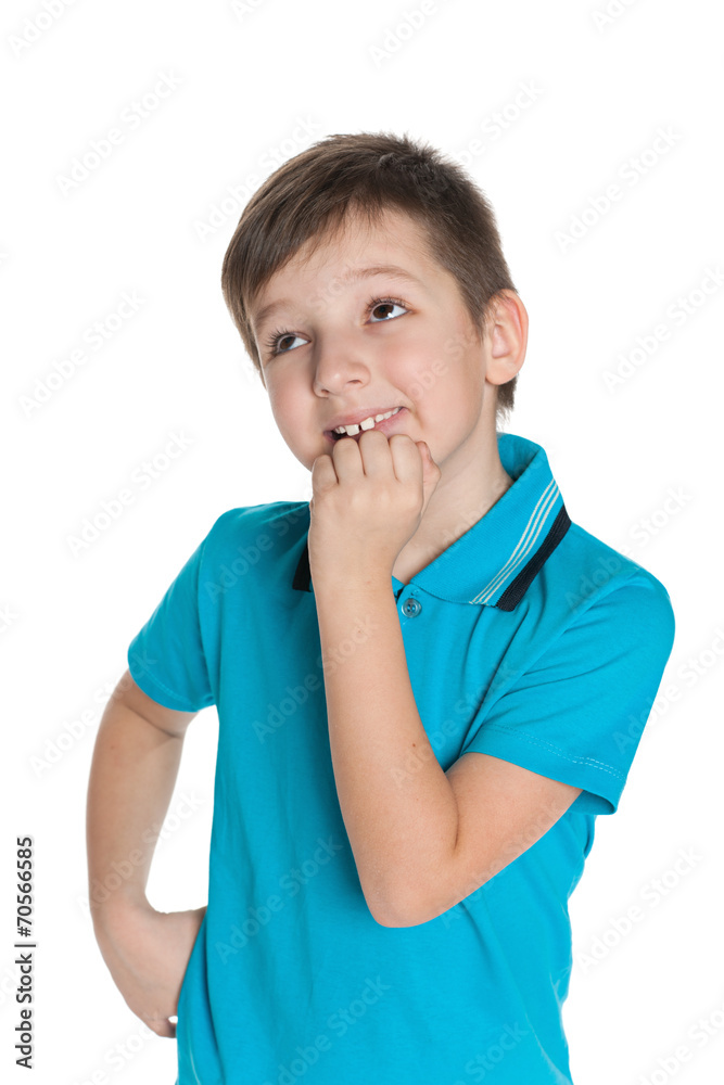 Curious little boy against the white Curious little boy against the white