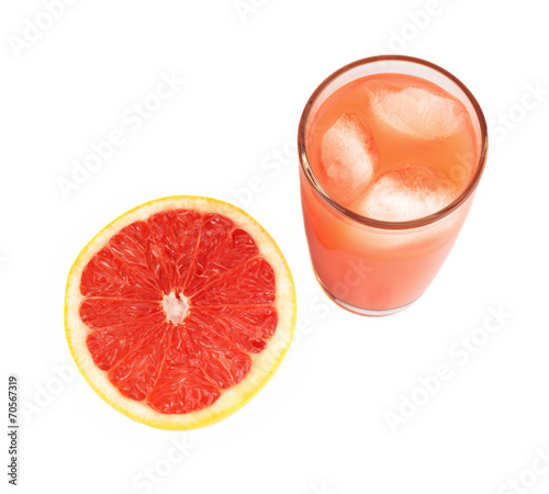 Studio shot sliced grapefruit with juice isolated white