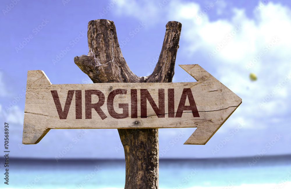 Virginia wooden sign with a beach on background