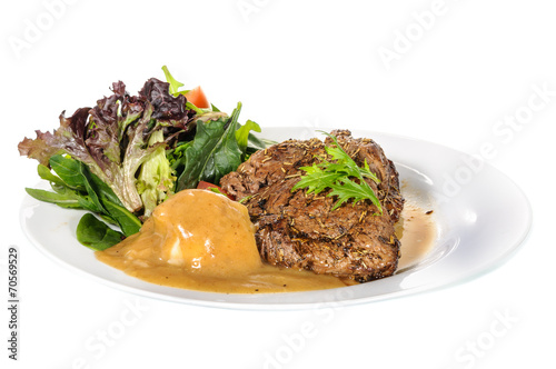 Rump steak with mashed potatoes and mix vegetable on plate