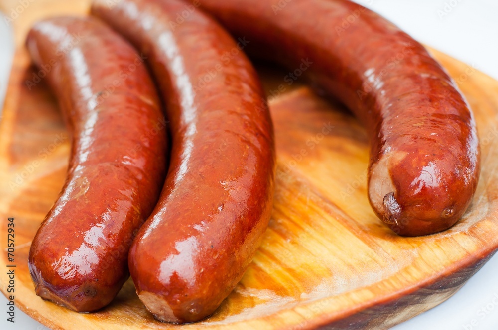 Fresh sausage roasted on the grill Fresh sausage roasted on the grill