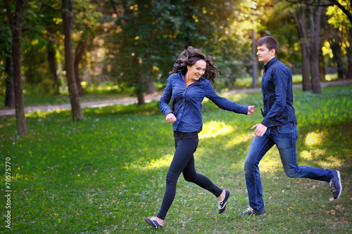 couple in love in the park runs