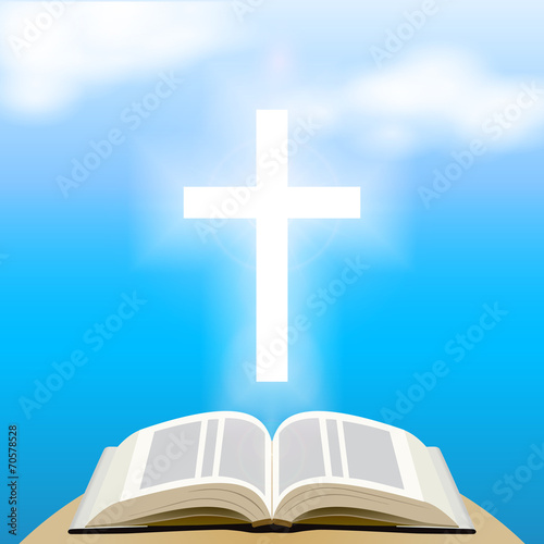 Bible and shining cross over blue sky.