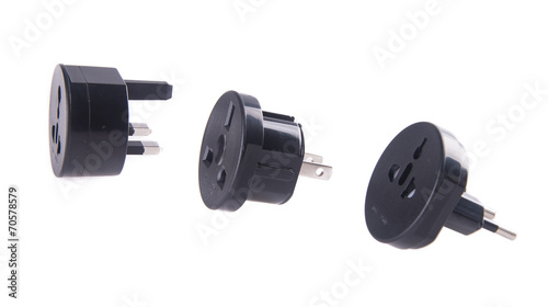Travel plug adapter on a background