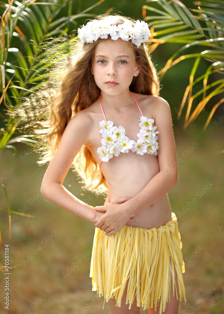 portrait of little girl in tropical style Photos | Adobe Stock