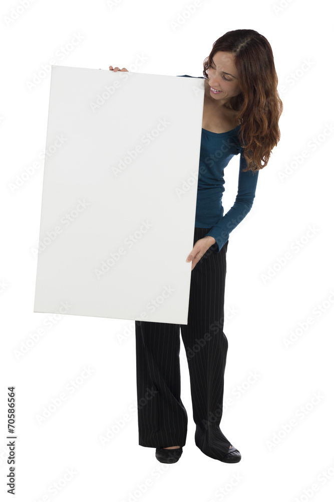 Woman looking and showing a blank billboard Woman looking and showing a blank billboard