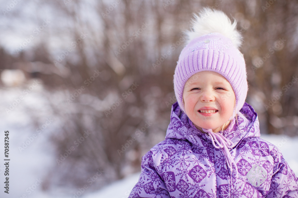 Portrait of little cute happy girl in snow sunny winter day Portrait of little cute happy girl in snow sunny winter day