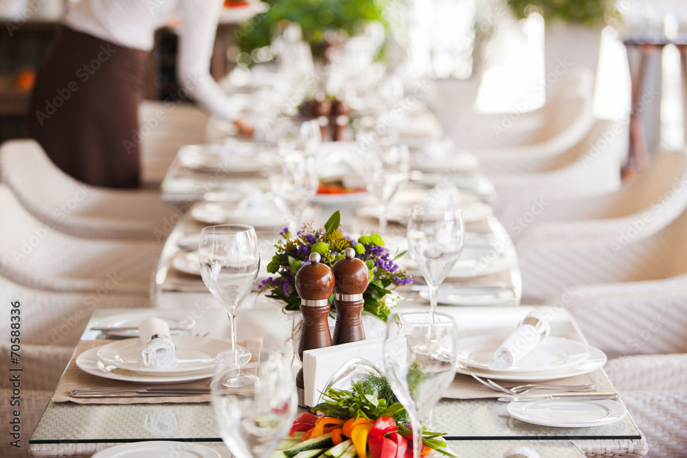 Fototapeta premium table setting in restaurant interior, desaturated